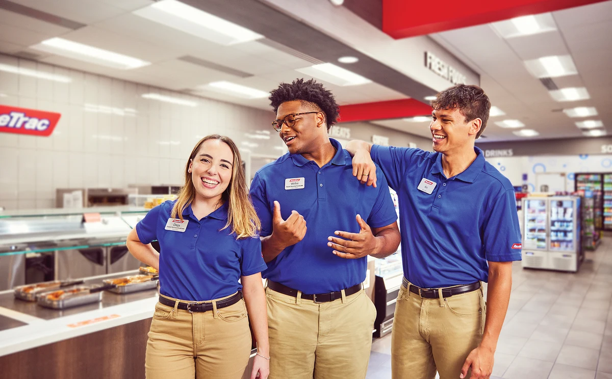RaceTrac store associates in front of the hot bar
